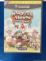 Front of GameCube case showing Harvest Moon Magical Melody Player's Choice artwork