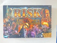Closed game box top showing Lord of the Rings Risk Trilogy Edition artwork