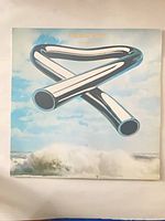 Front cover with tubular bell artwork