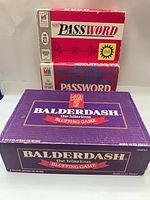 Front view showing Balderdash box and two Milton Bradley Password game boxes