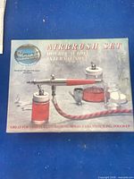 Front of Paasche Airbrush Set box showing model details