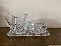 Full view of creamer, sugar bowl and tray