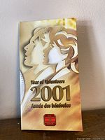 Front of presentation folder with Year of Volunteers 2001 graphics