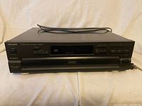 Front view of Technics SL-PD627 CD changer with power cord