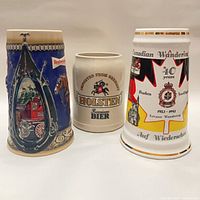 Front view of all three beer steins side by side