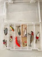 Full tackle box open showing all lures in compartments
