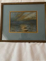 Full view of framed watercolor painting