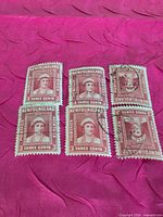 All six Newfoundland 3¢ rose-red stamps arranged together