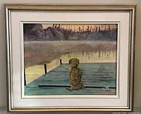 Framed oil painting showing dog on dock at sunset