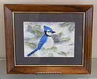 Front view of framed watercolour painting showing artwork, mat, and frame