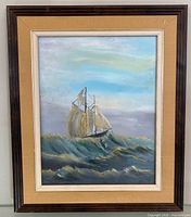 Full view of framed seascape painting