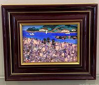 Full view of framed painting showing burgundy frame and artwork