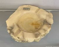 Top view showing bowl, rests, label