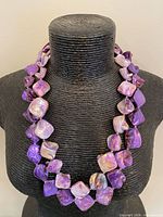 Necklace on bust form showing bead shape and color