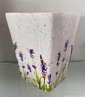 Front view of square ceramic planter with lavender sprig design