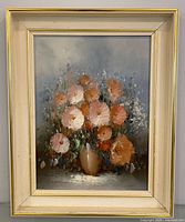 Front view of framed floral still life oil painting
