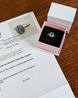 Ring in presentation box with appraisal document