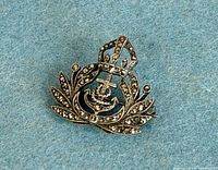 Front view showing crowned anchor and marcasites