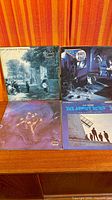All four Moody Blues LP covers laid out