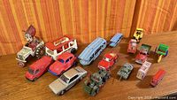 Group shot of all vehicles on wooden surface