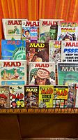 Full rack view showing all MAD magazines and paperbacks