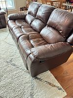 Front view of sofa showing seating and arm design