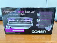 Front of retail box detailing features and showing product