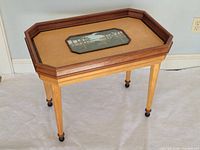 Full view of handcrafted octagonal maple and rosewood tray table showing landscape under glass