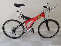 Right-side profile of Specialized FSR Ground Control mountain bike showing full frame, suspension components, drivetrain, wheels, tires, handlebar, saddle, and water bottle