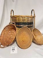 Group view of handled basket and three trays