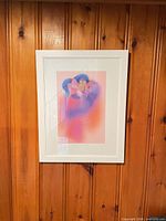 Full view of framed print on wall