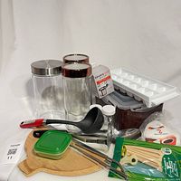 Full lot overview showing all storage containers, utensils, ice cube tray, kimchi box, K-Cup box, skewers and filters