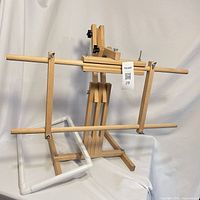 Full view of both wooden adjustable frame and plastic frame
