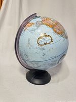 Full view of Replogle globe on plastic base