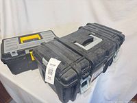 Both toolboxes closed, size comparison