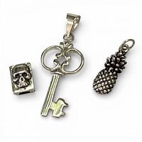 Skull bead, key pendant, pineapple charm