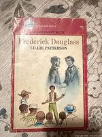 Front cover showing title, author, series, price and wear