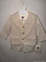 Front view of full three-piece suit on hanger showing jacket, insert, and shorts with tag