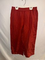 Front view of burnt orange linen-blend cropped pants