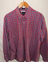 Front view of J.Crew red & blue gingham shirt on hanger