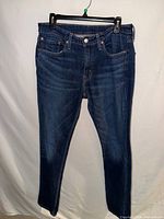 Front view of Levi's dark wash 511 jeans