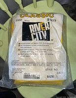 Factory-sealed River City Classic 200 Series rain suit package showing branding, style 2003, size L