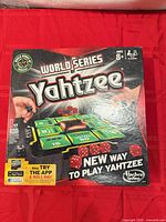 Front of box showing World Series of Yahtzee branding and age recommendation