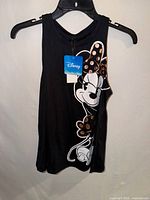 Front view of black Disney Minnie Mouse tank top with tag
