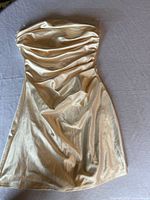 Front view of strapless satin mini dress