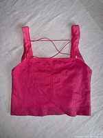 Front view of pink ribbed knit crop bra top