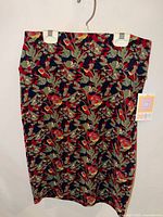 Front view of LuLaRoe patterned skirt hanging on hanger