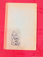 Front cover showing cloth boards with small illustration