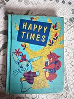 Front cover showing title Happy Times with illustrated rabbit and fox