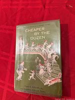 Front cover with dust jacket and title